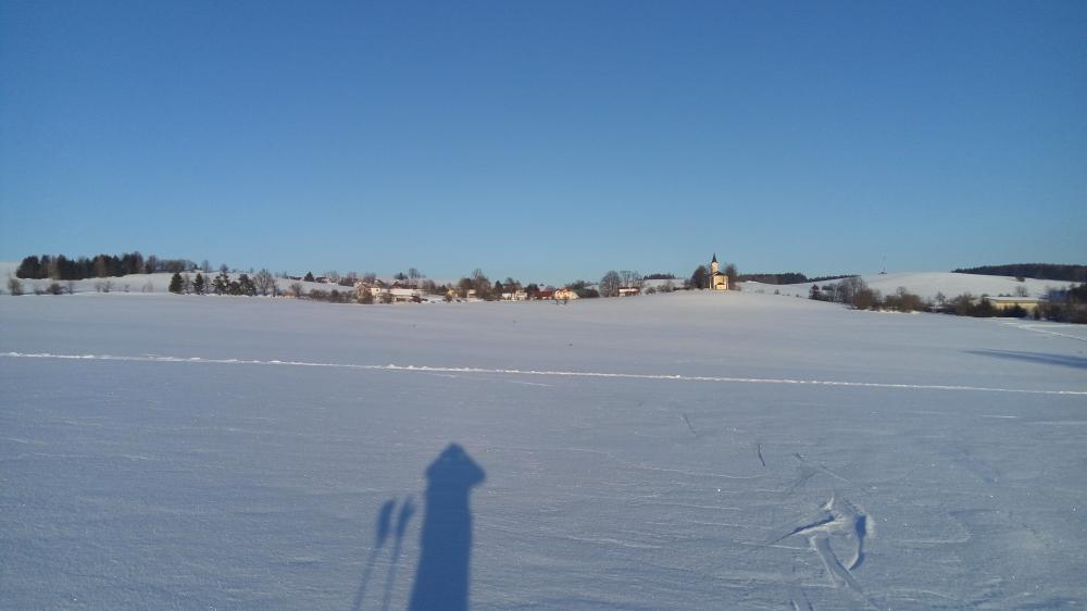 Fotící lyžař